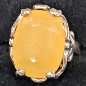 Wow! Yellow beryl 18x14m size 7 ring in sterling silver